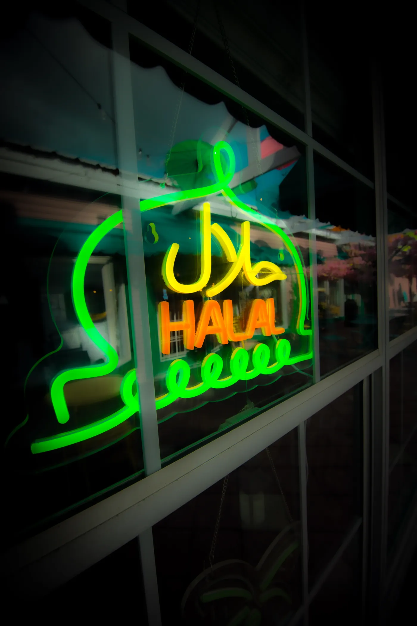 Maya Thai Cuisine neon sign inside the restaurant