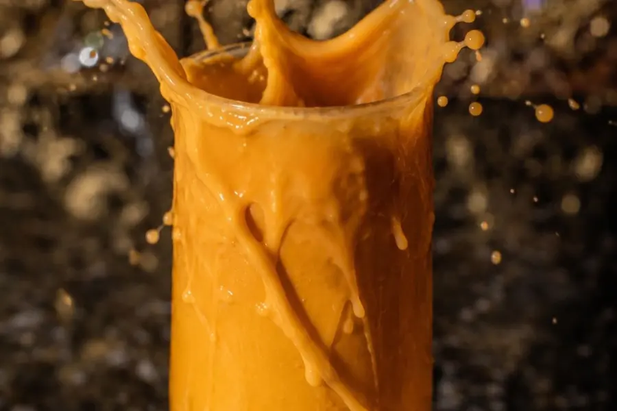 Maya Thai Cuisine Thai iced tea in a chilled glass